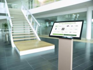 Q-Cal visitor management system in lobby.