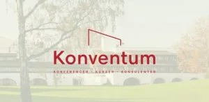 Garden outside Konventum with logo