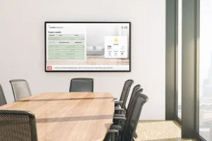 Digital sign hanging in an office displaying meeting information, the weather and other useful informations in offices.